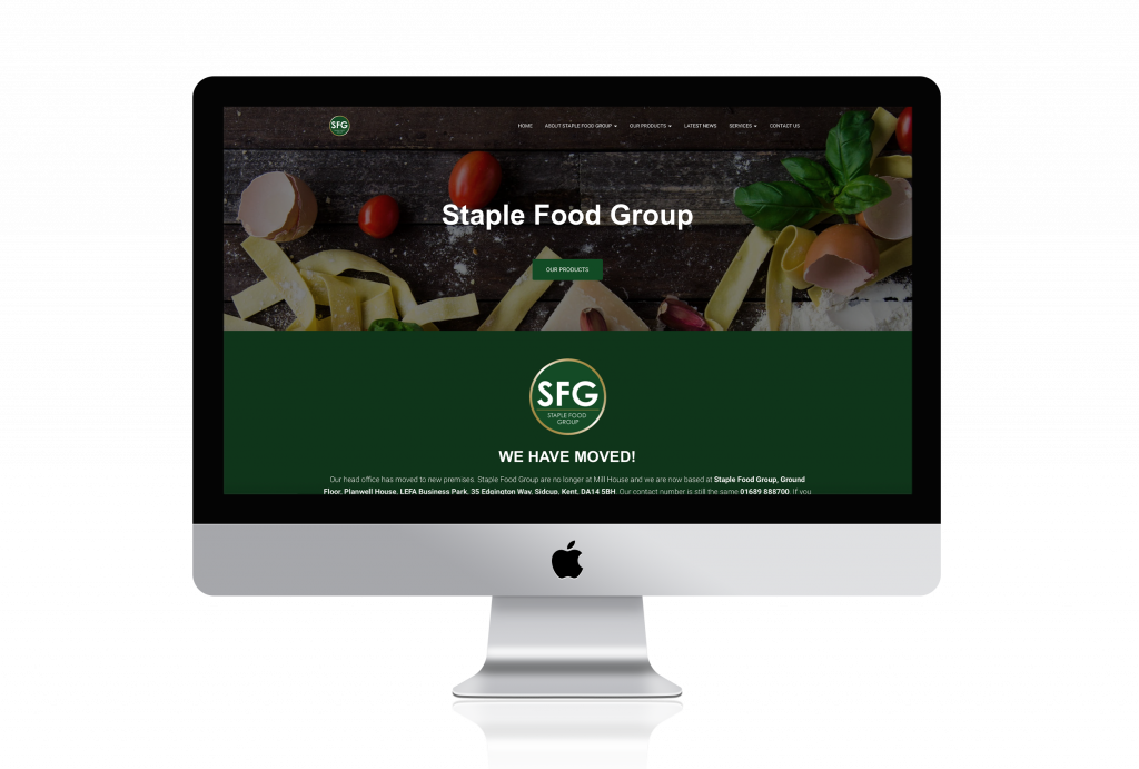 Staple Food Group website homepage on a Mac screen